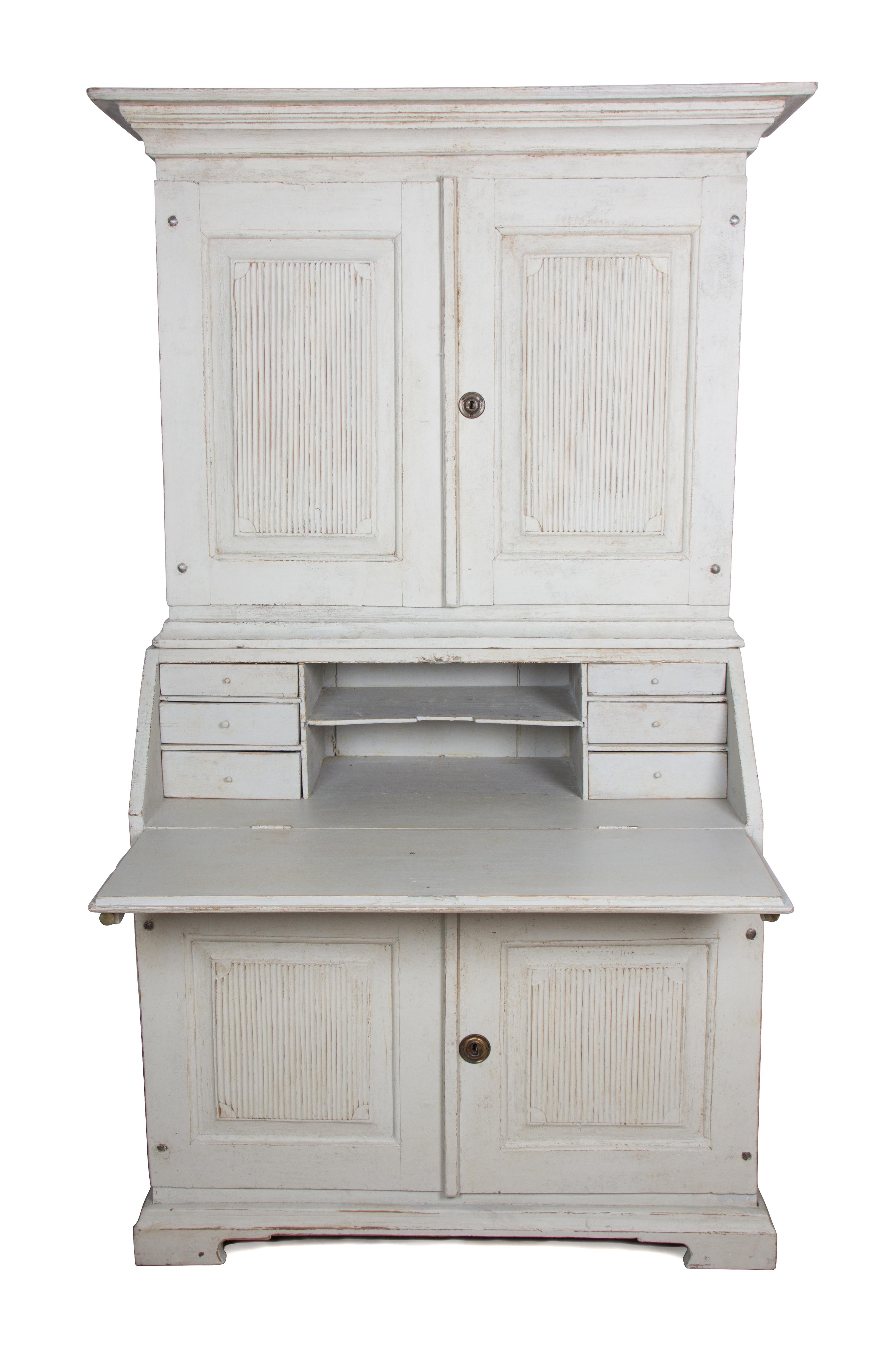 A Swedish White-Painted Secretary Bookcase Height 74 1/2 x width 44 1/4 x depth 21 1/4 inches. — LATE 19TH/EARLY 20TH CENTURY