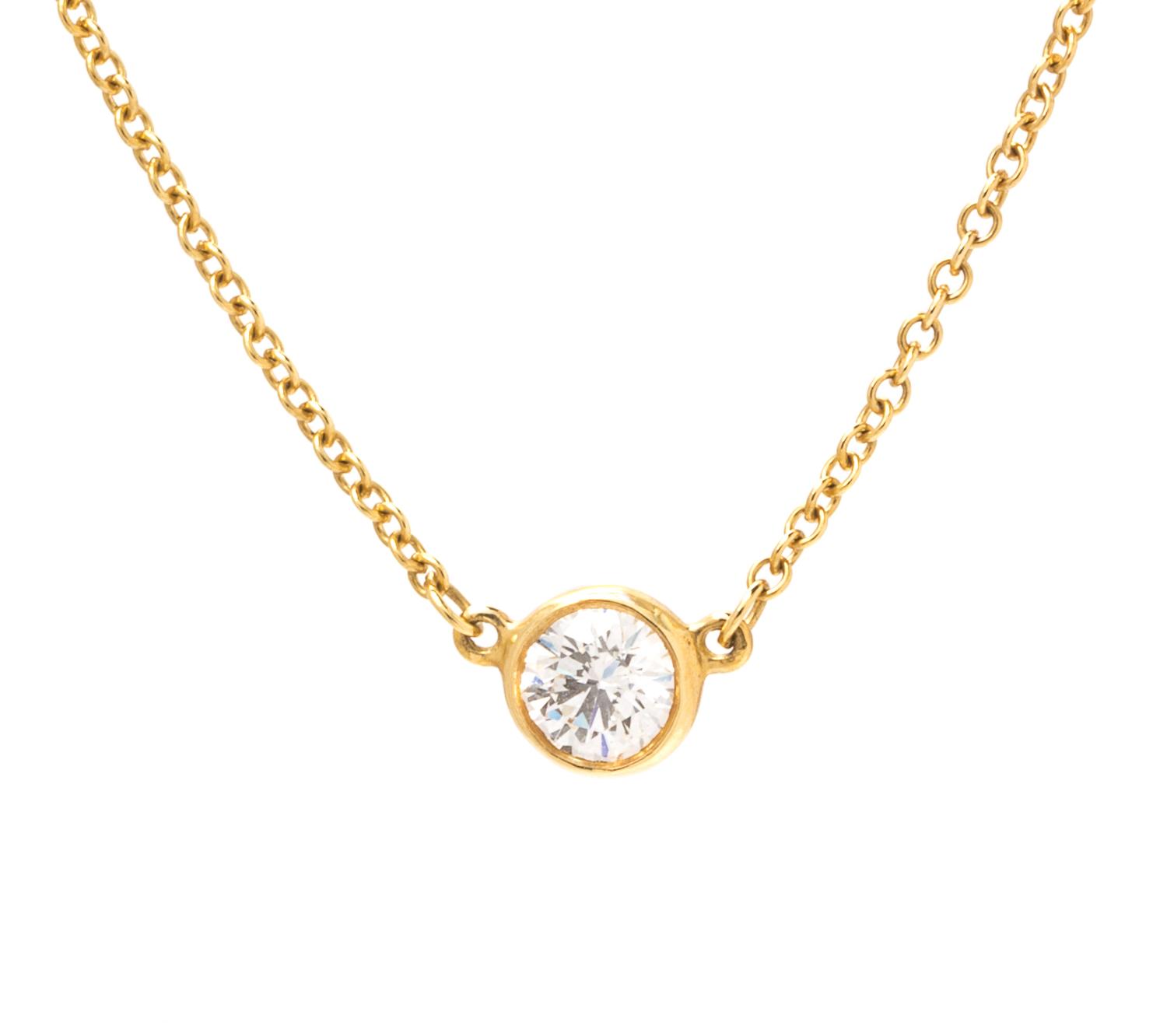 An 18 Karat Yellow Gold and "Diamonds by the Yard" Solitaire Necklace, Elsa Peretti for Tiffany & Co., 1.20 dwts.