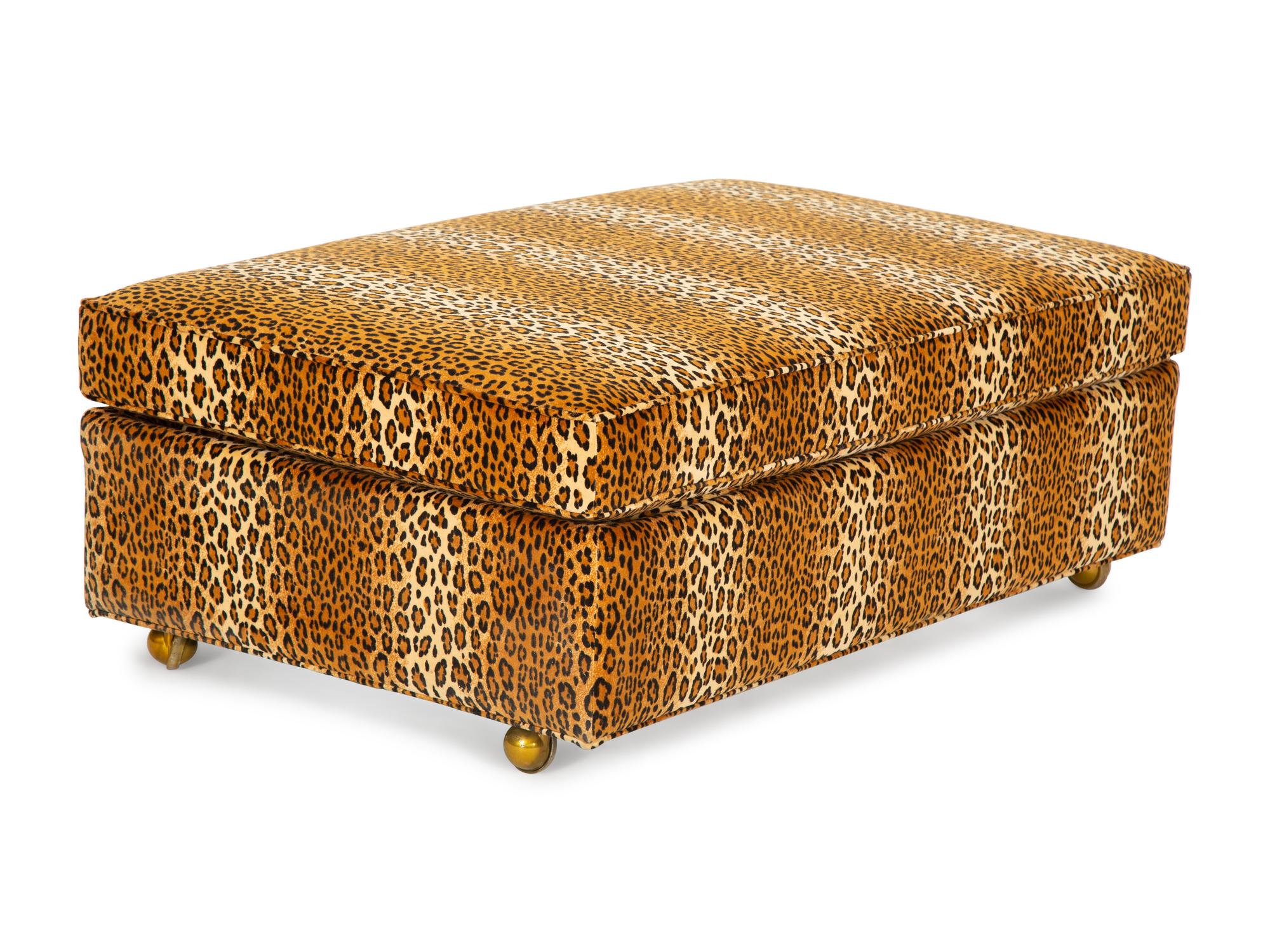 A Carlye Cheetah Print Upholstered Convertible Ottoman