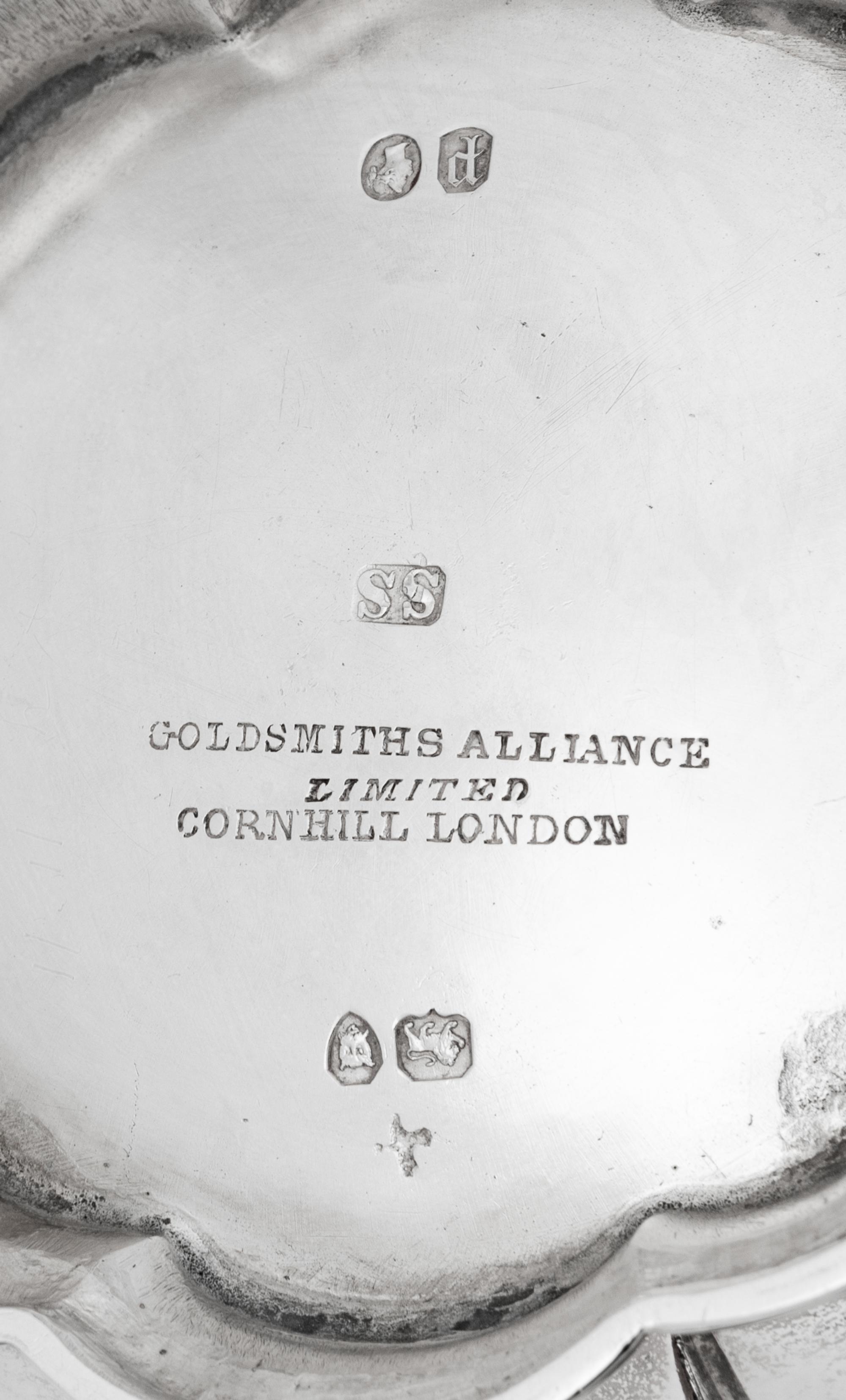 A Cased Victorian Silver Four-Piece Tea and Coffee Service