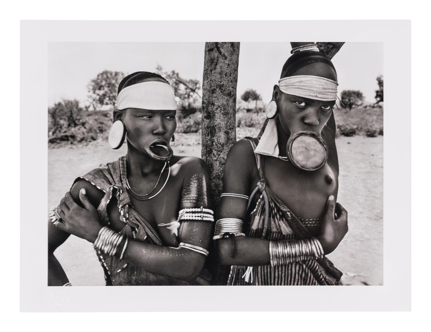 Genesis: Art Edition, Taschen, Paris 2013 (SUMO in two volumes together with booklet, varnished cherry wood lectern designed by Tadao Ando, and signed gelatin silver print Two Mursi Women, Omo Valley, Ethiopia )