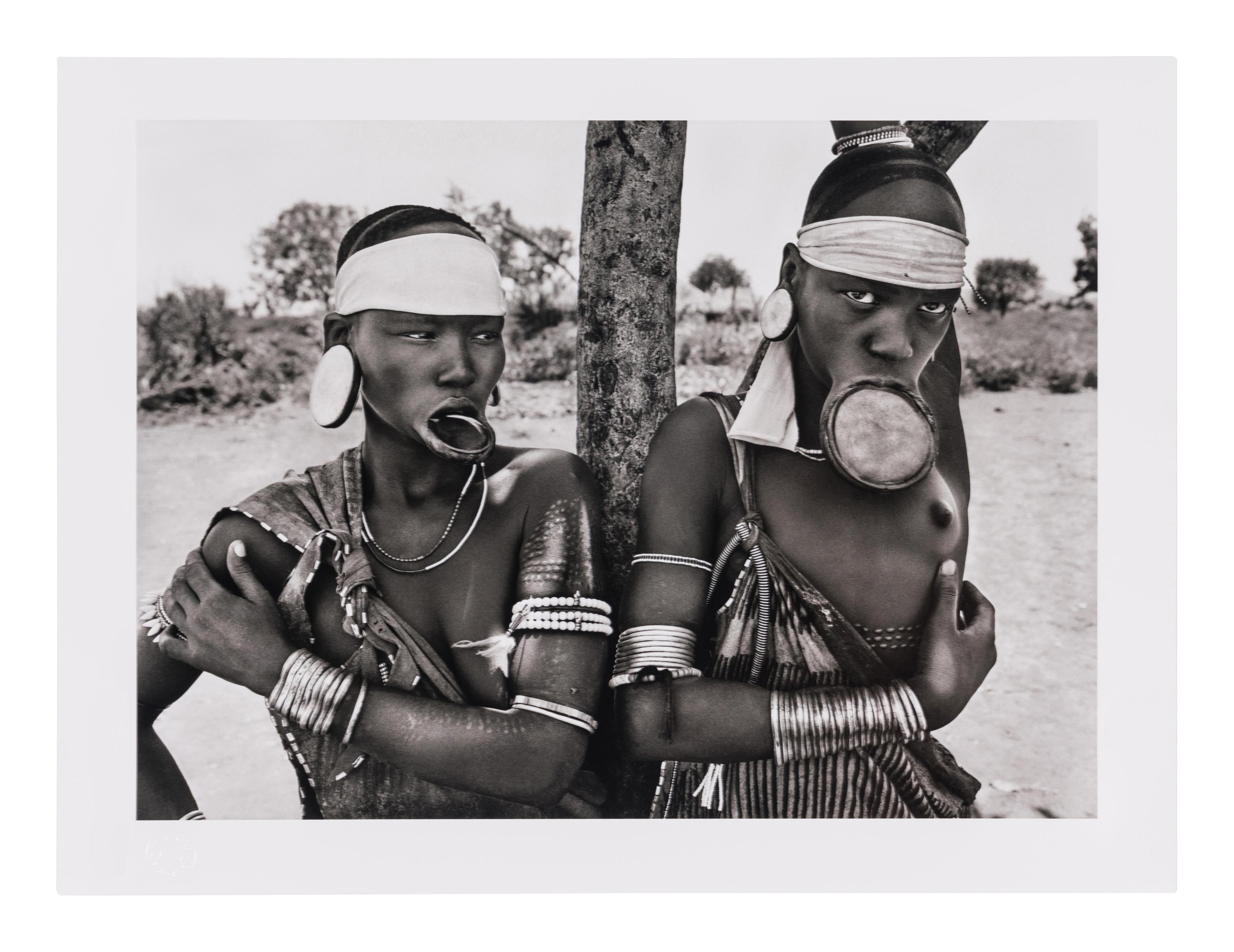 Genesis: Art Edition, Taschen, Paris 2013 (SUMO in two volumes together with booklet, varnished cherry wood lectern designed by Tadao Ando, and signed gelatin silver print Two Mursi Women, Omo Valley, Ethiopia )