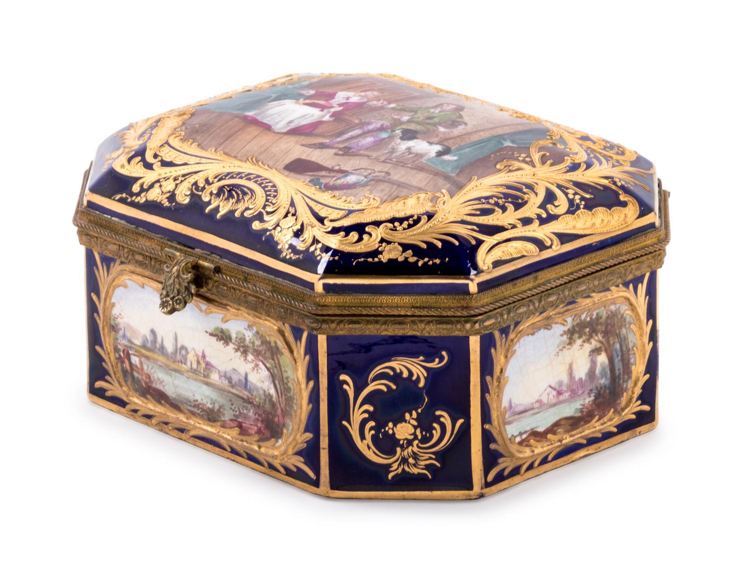 A Sèvres Style Gilt Metal Mounted, Painted and Parcel Gilt Porcelain Table Casket