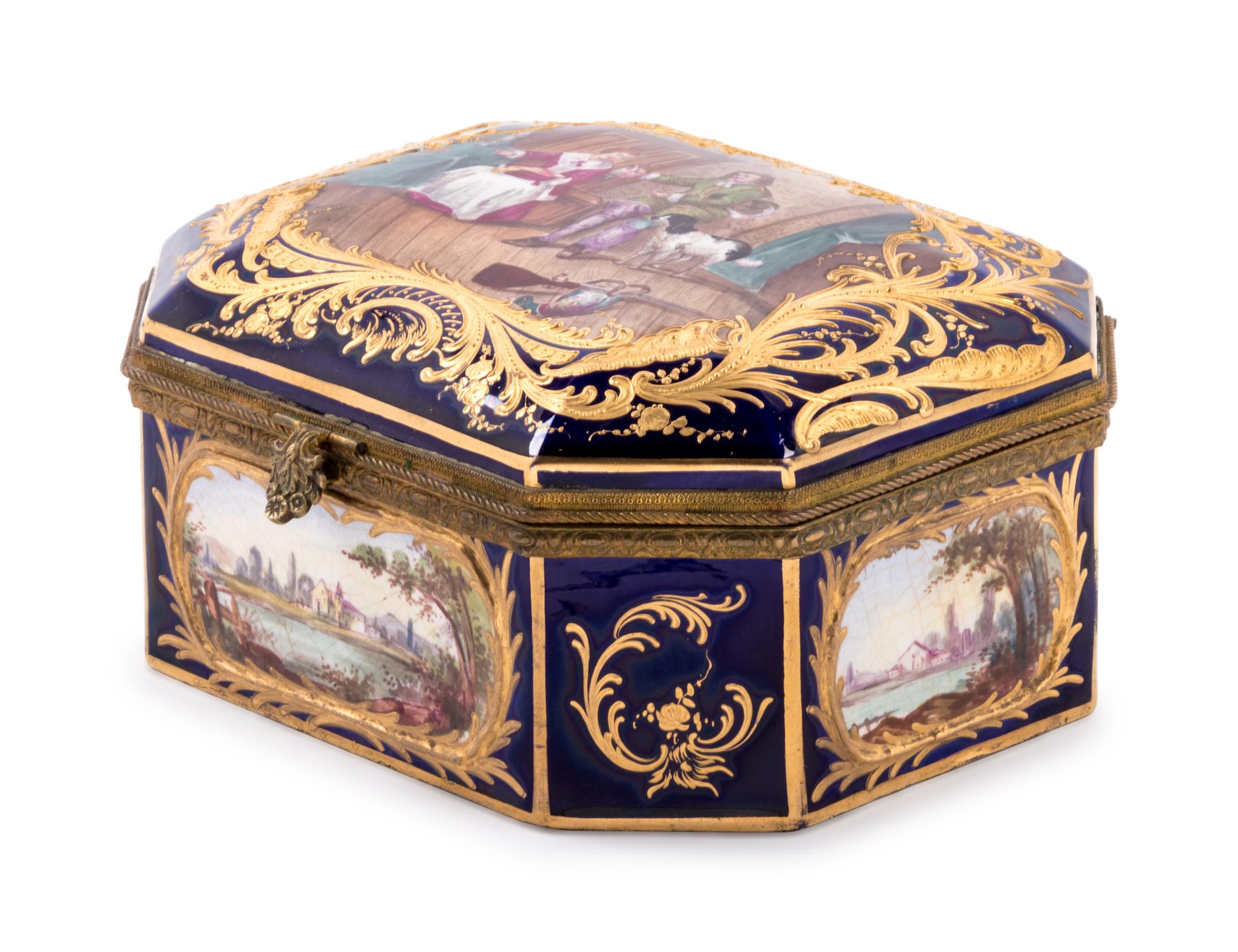 A Sèvres Style Gilt Metal Mounted, Painted and Parcel Gilt Porcelain Table Casket