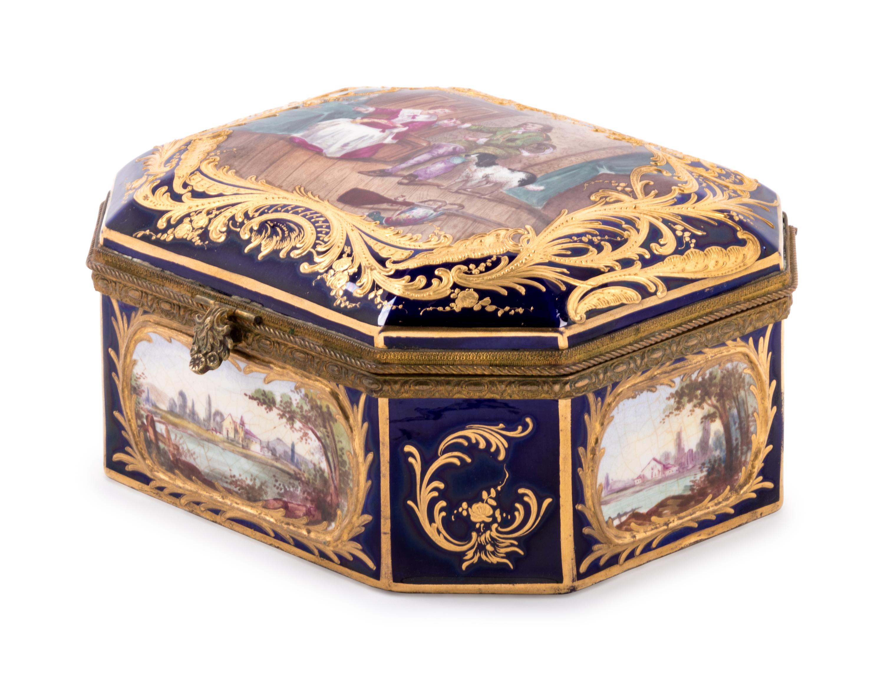 A Sèvres Style Gilt Metal Mounted, Painted and Parcel Gilt Porcelain Table Casket