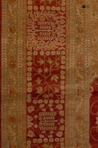 An Indo-Tabriz Wool Rug