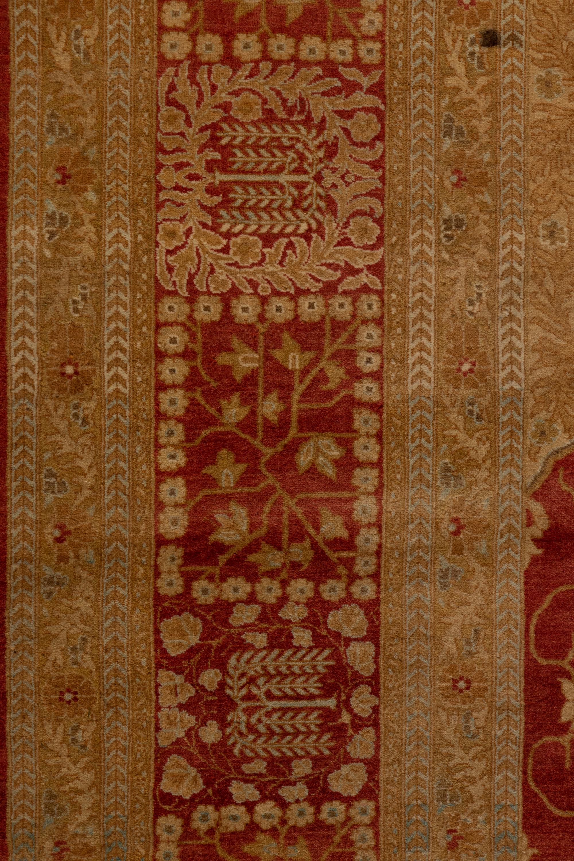 An Indo-Tabriz Wool Rug