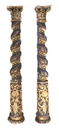 A Pair of Continental Painted and Parcel Gilt Solomonic Columns, Height 124 inches.