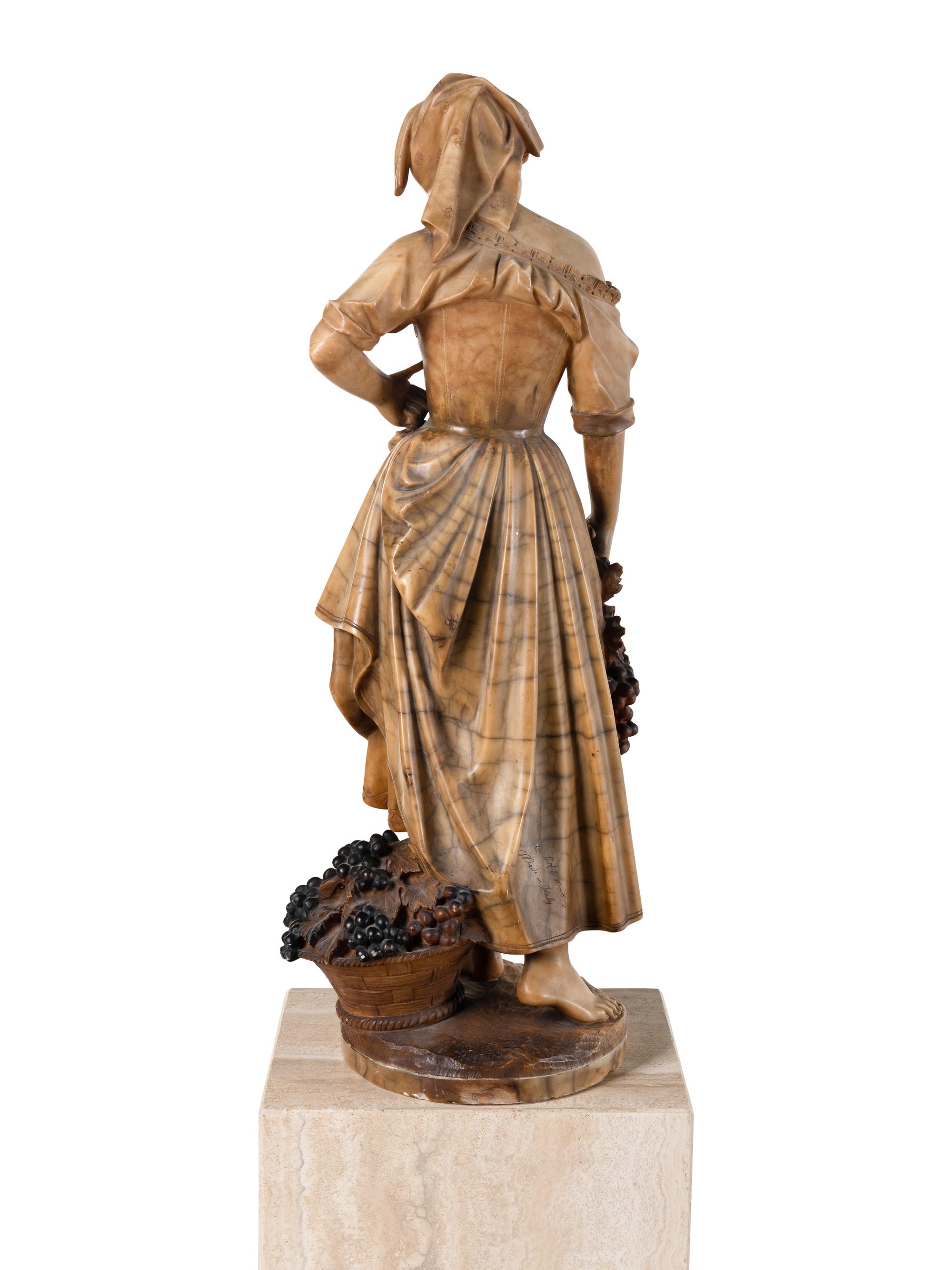 A Continental Carved Alabaster Sculpture