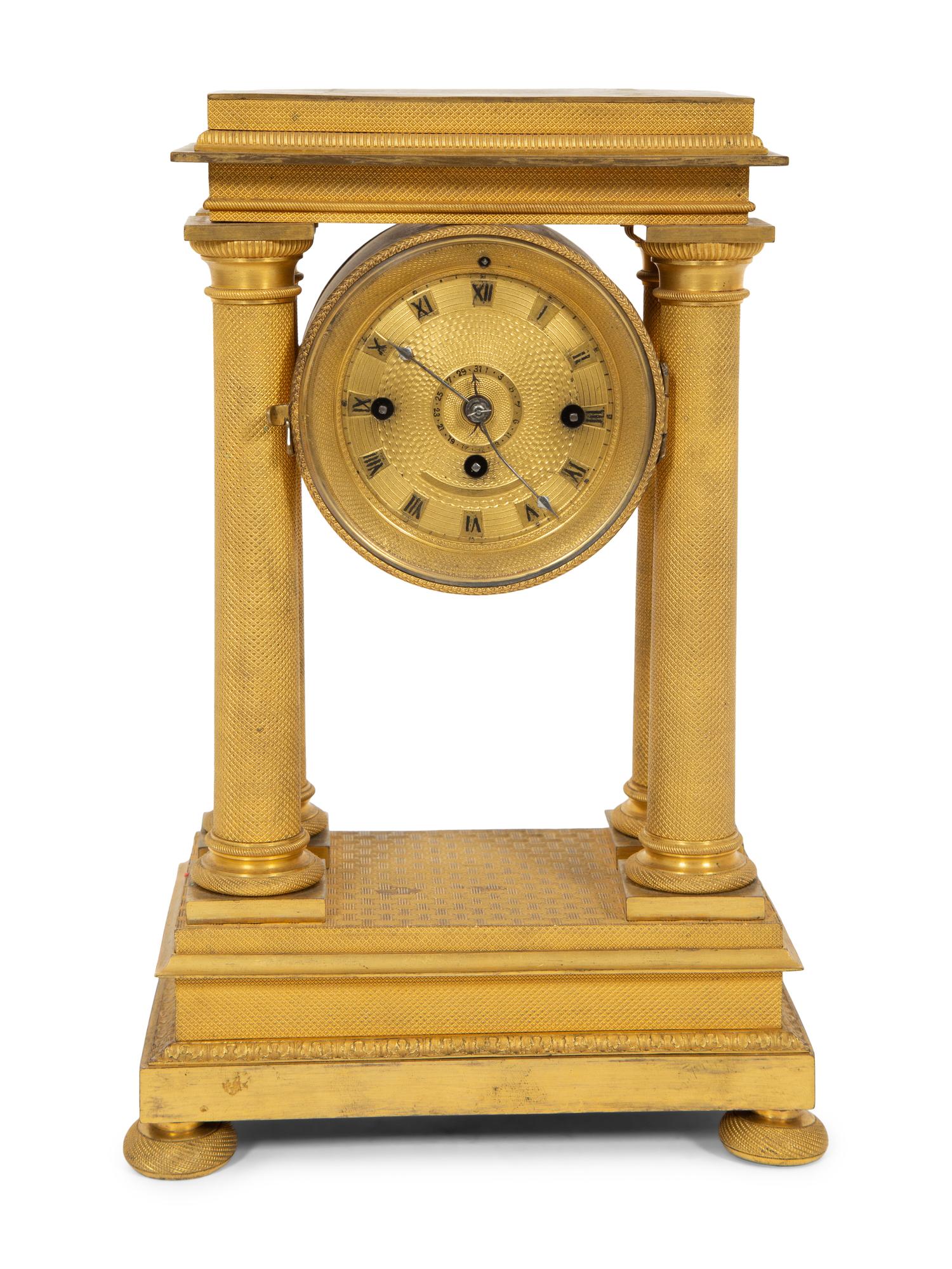 An Empire Style Gilt Bronze Portico Clock