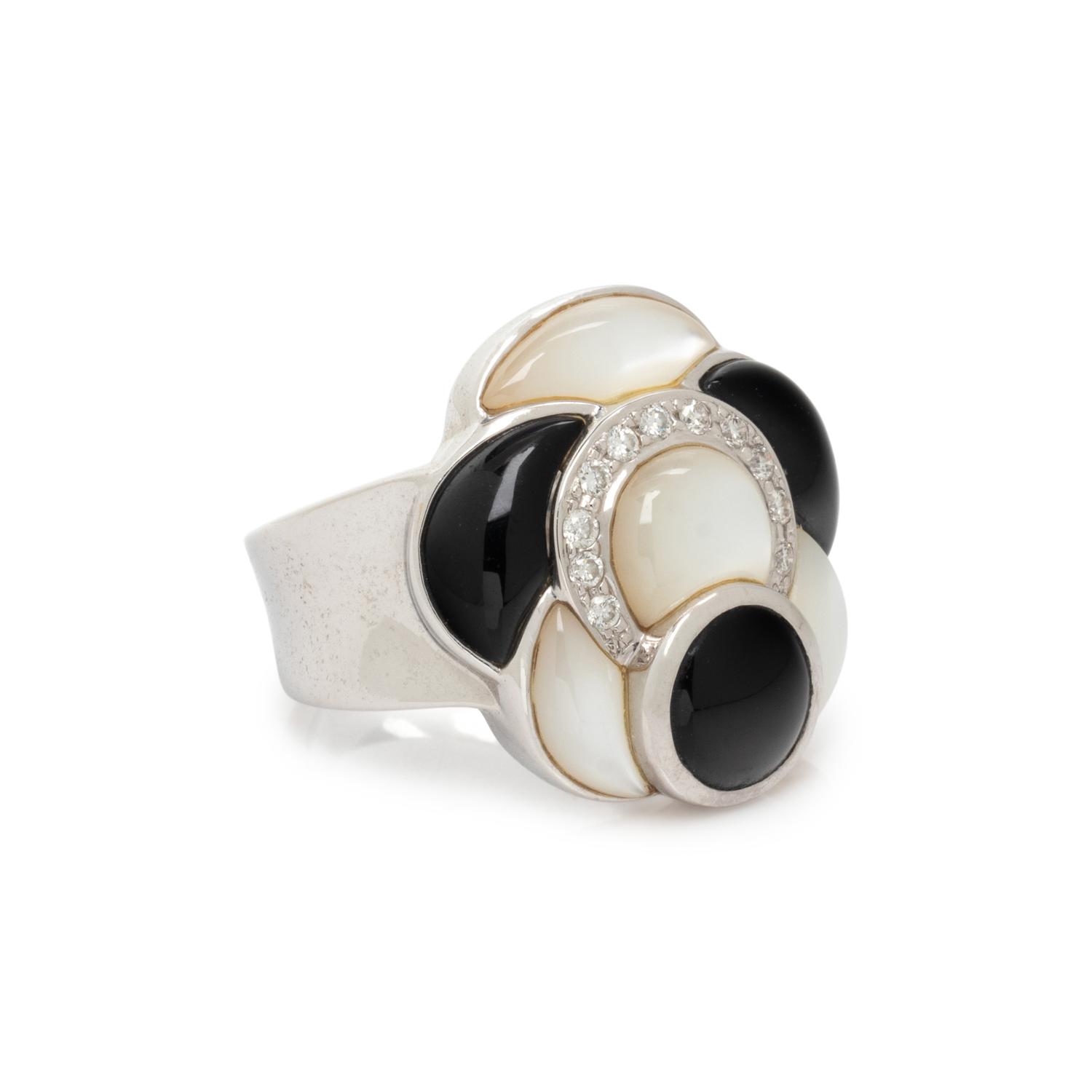 MOTHER-OF-PEARL, ONYX AND DIAMOND RING