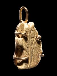 An Egyptian Faience Wadjet Eye Pendant