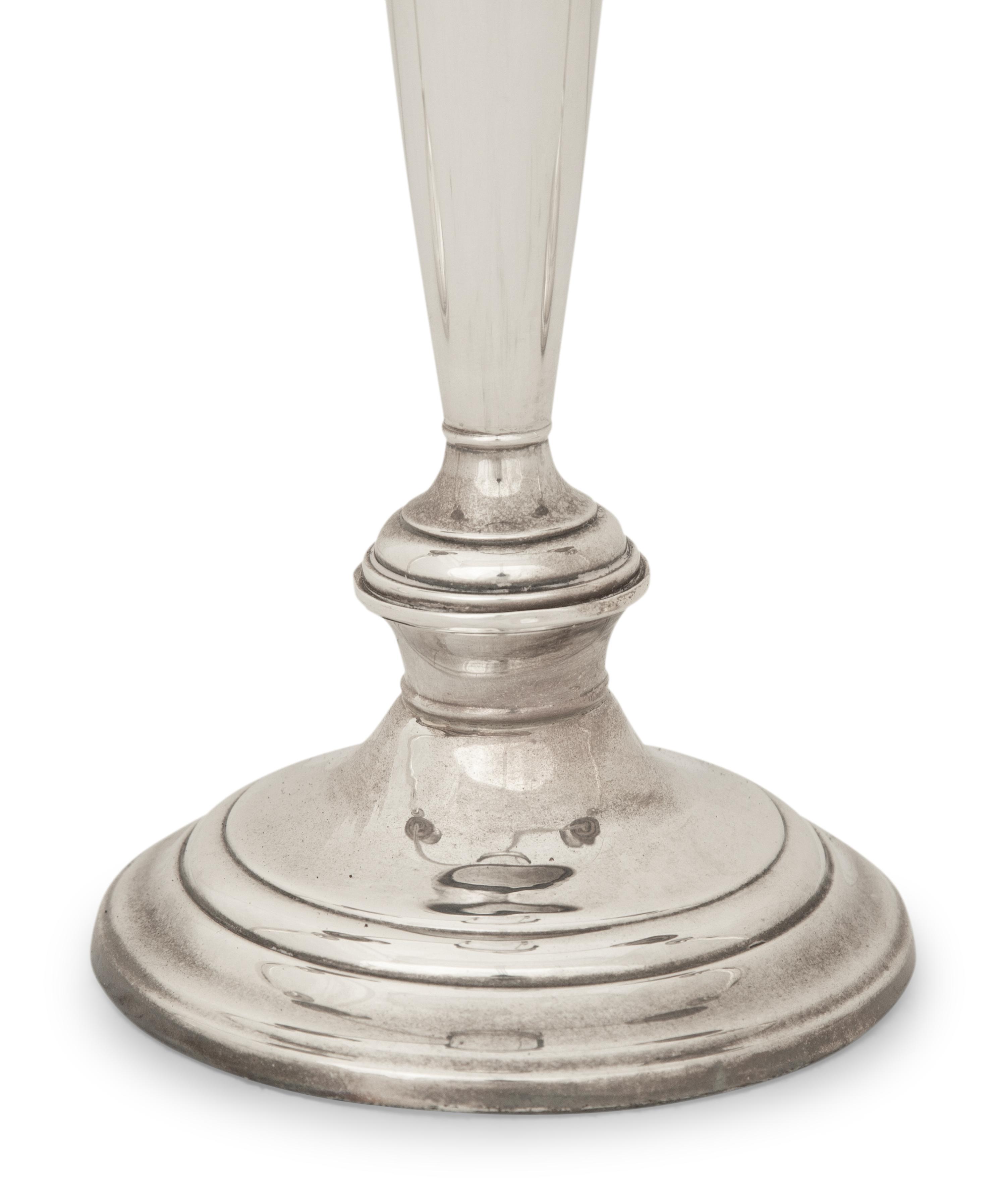A Pair of American Silver Candlesticks and an American Silver Three Light Candelabrum
