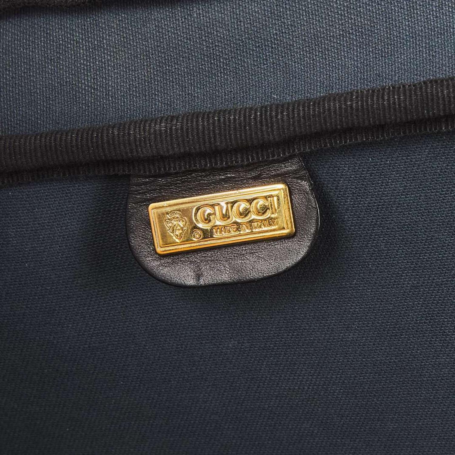 A Vintage Gucci Web Suitcase Gucci