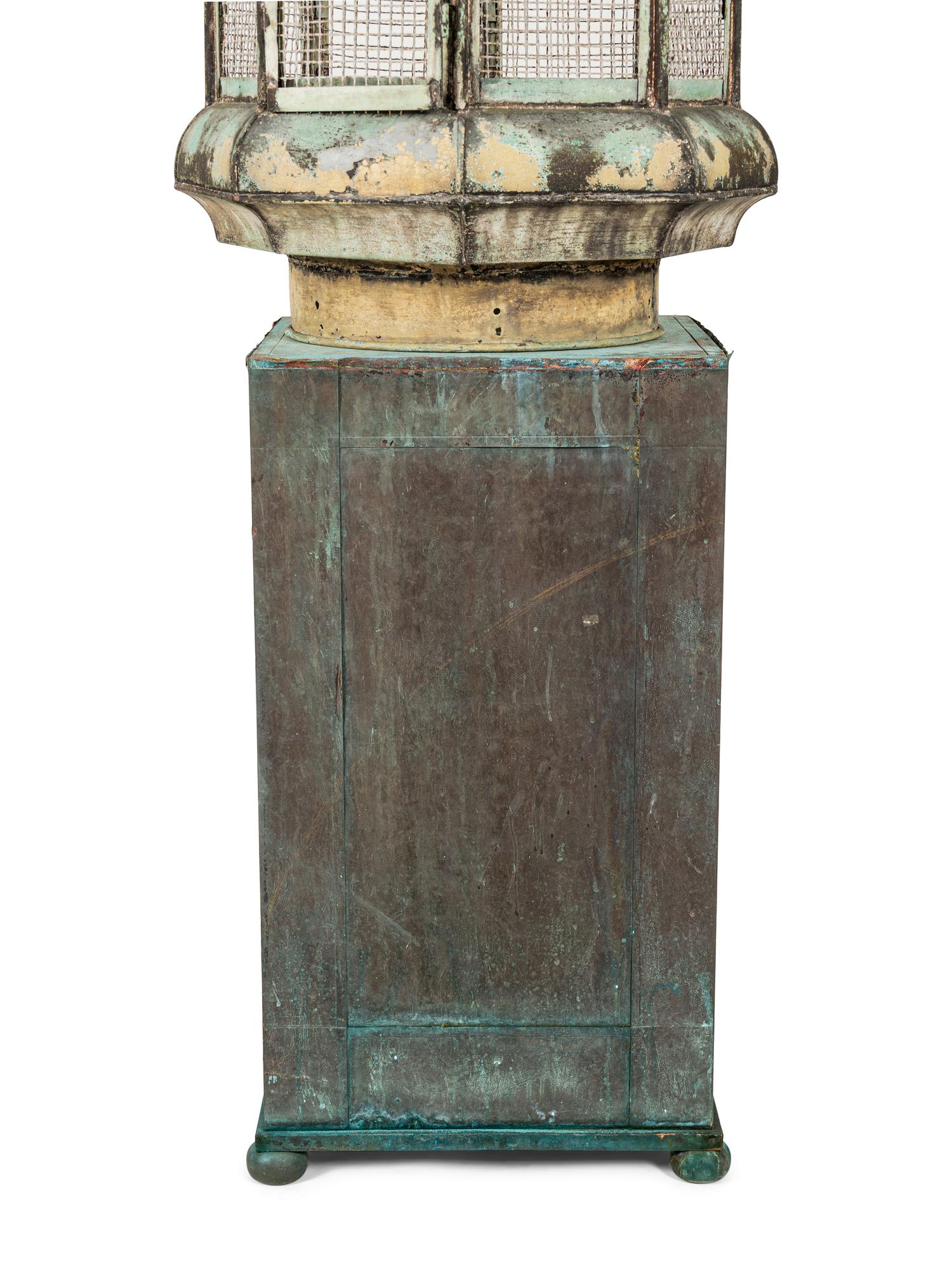 A Pair of Weathered Painted Sheet Metal Lanterns Converted to Bird Cages