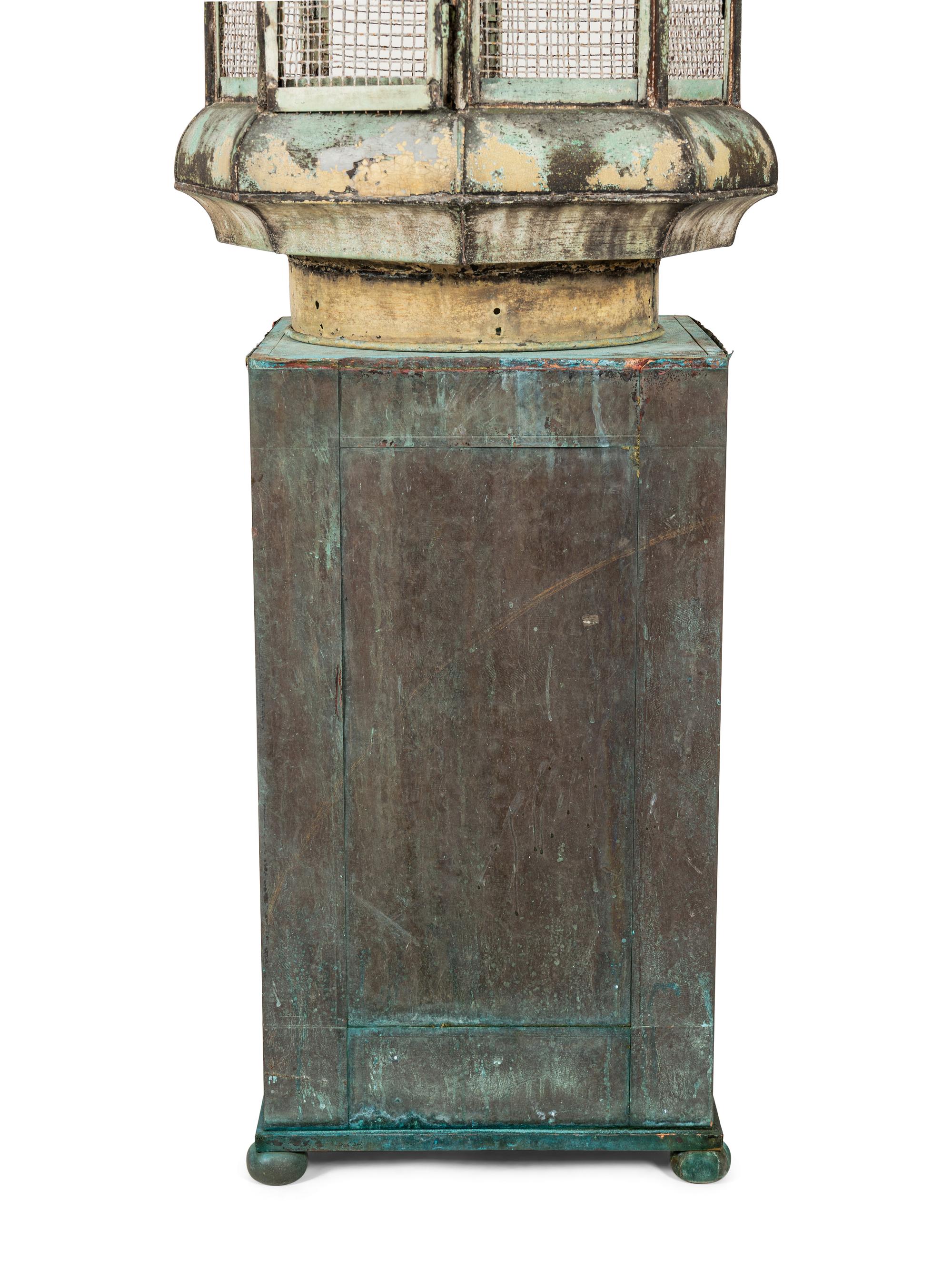 A Pair of Weathered Painted Sheet Metal Lanterns Converted to Bird Cages