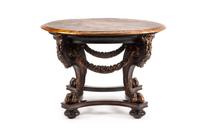 A Continental Carved and Painted Center Table Height 30 x diameter of top 42 1/2 inches. — 19TH CENTURY