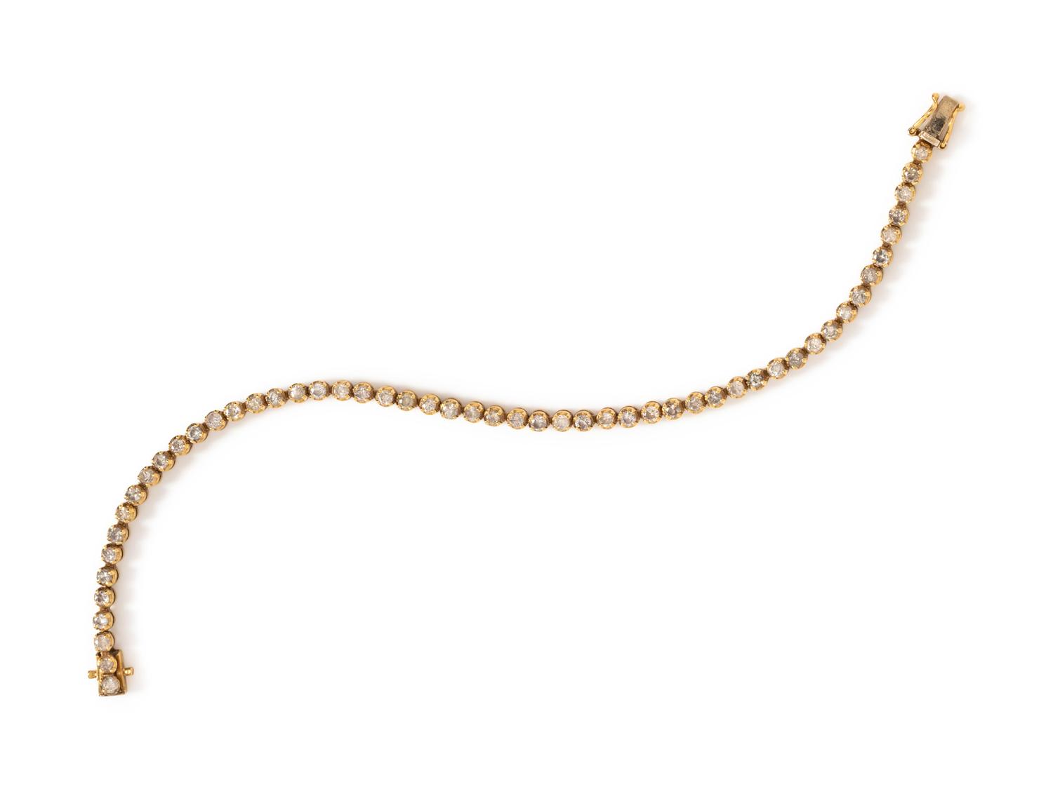 A 14 Karat Yellow Gold and Diamond Bracelet,