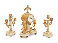 A Louis XVI Style Gilt Bronze and Marble Clock Garniture