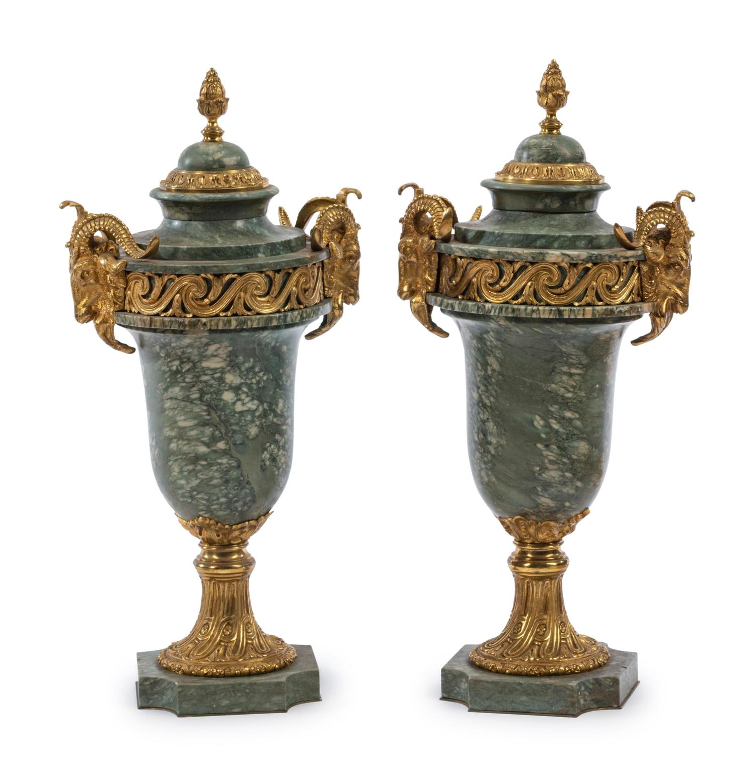 A Pair of Louis XVI Style Gilt Metal Mounted Marble Urns