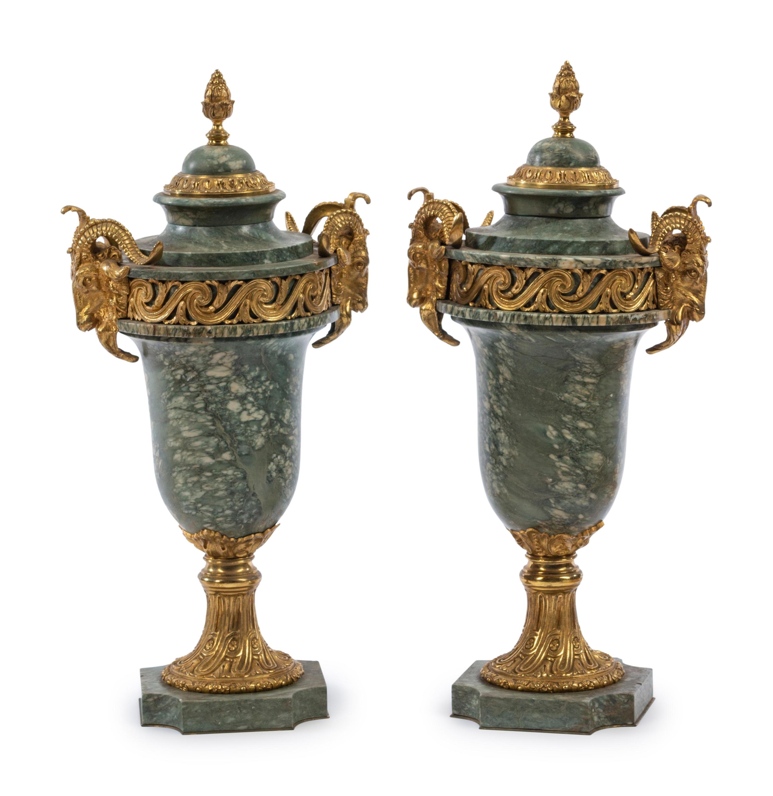 A Pair of Louis XVI Style Gilt Metal Mounted Marble Urns