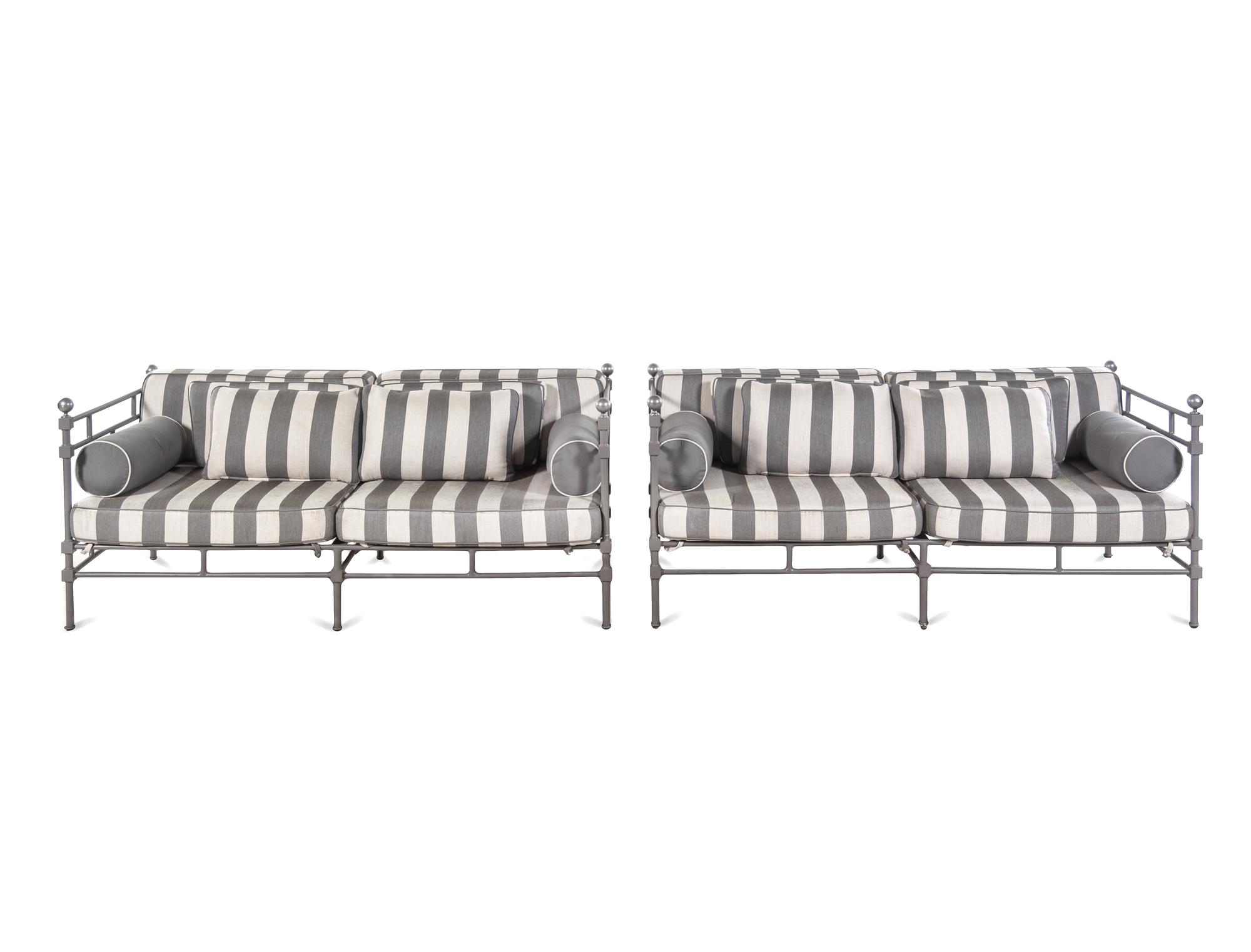 A Pair of Painted Metal Patio Sofas