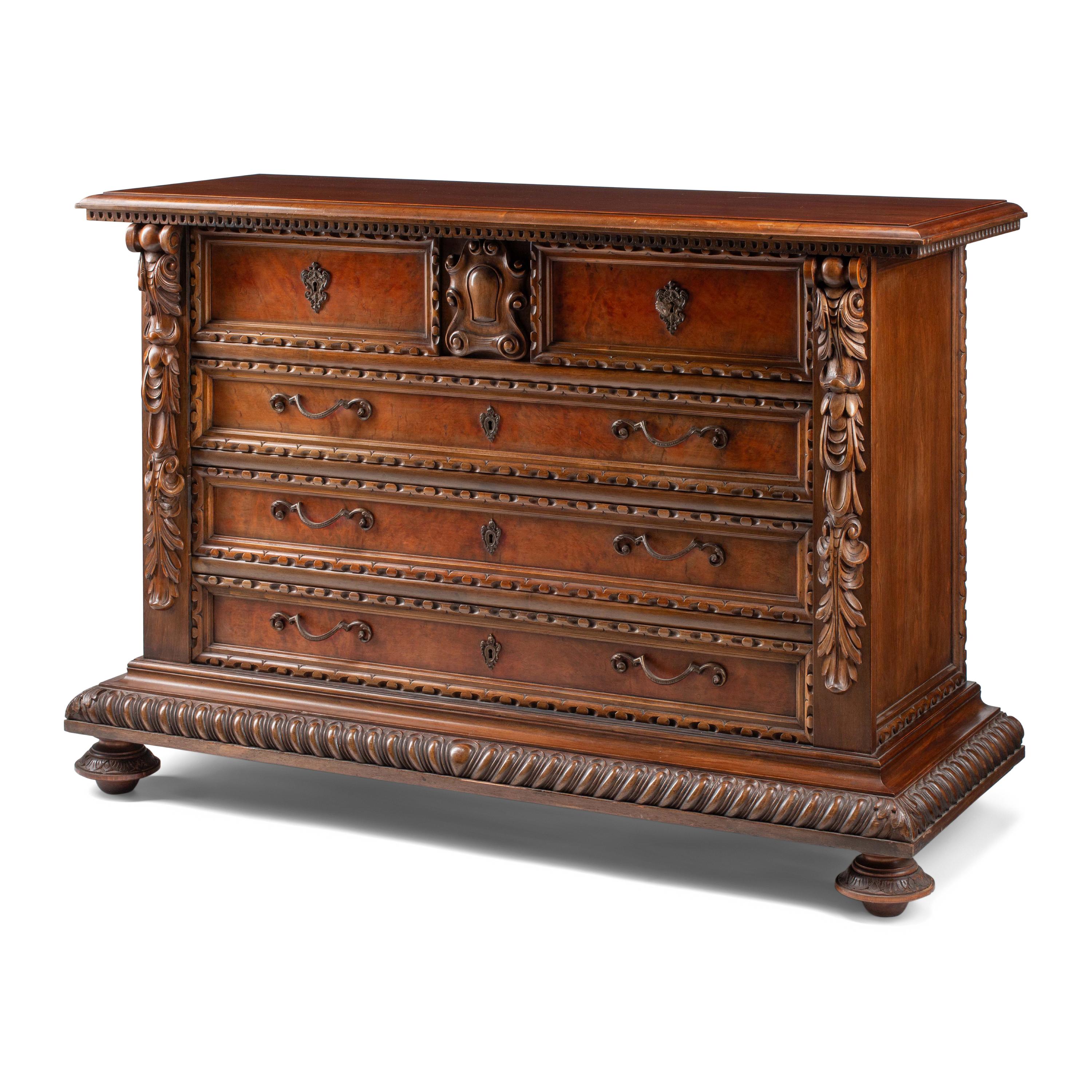 A Spanish Baroque Style Walnut Chest of Drawers