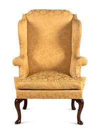 A George I Walnut Wingback Armchair