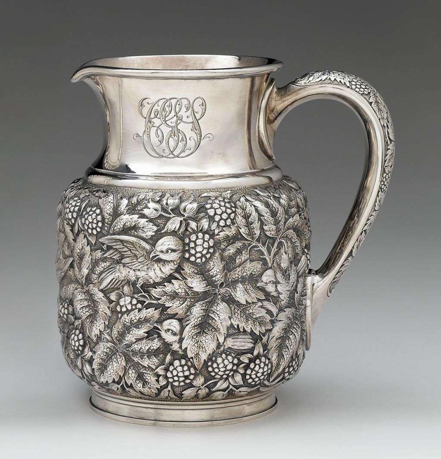 A fine sterling silver repoussé water pitcher thomas f. brogan (active 1896-1930), new york, ny, retailed by theodore b. starr