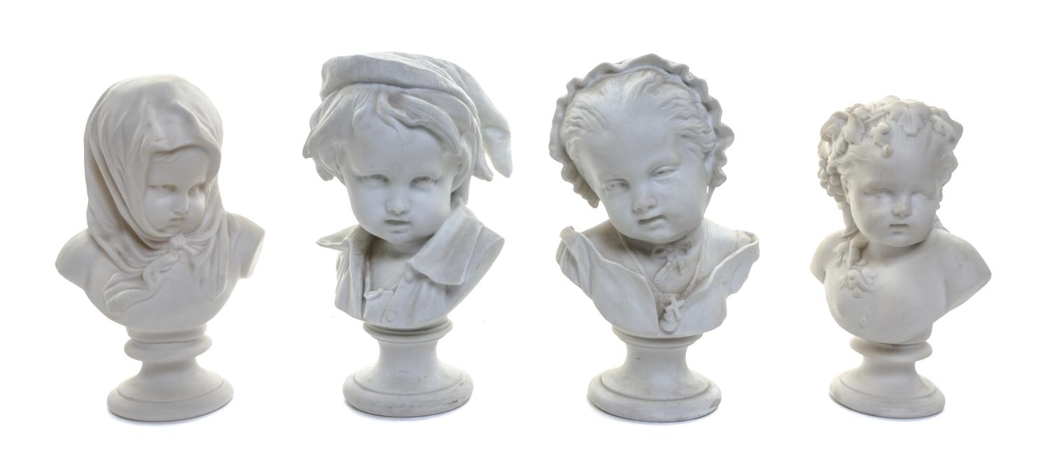 Four Parian Busts of Children Height of first 8 1/4 inches.