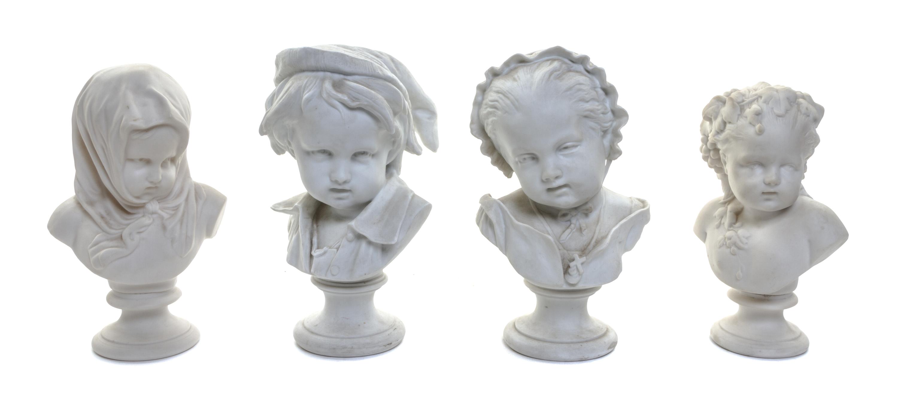 Four Parian Busts of Children Height of first 8 1/4 inches.