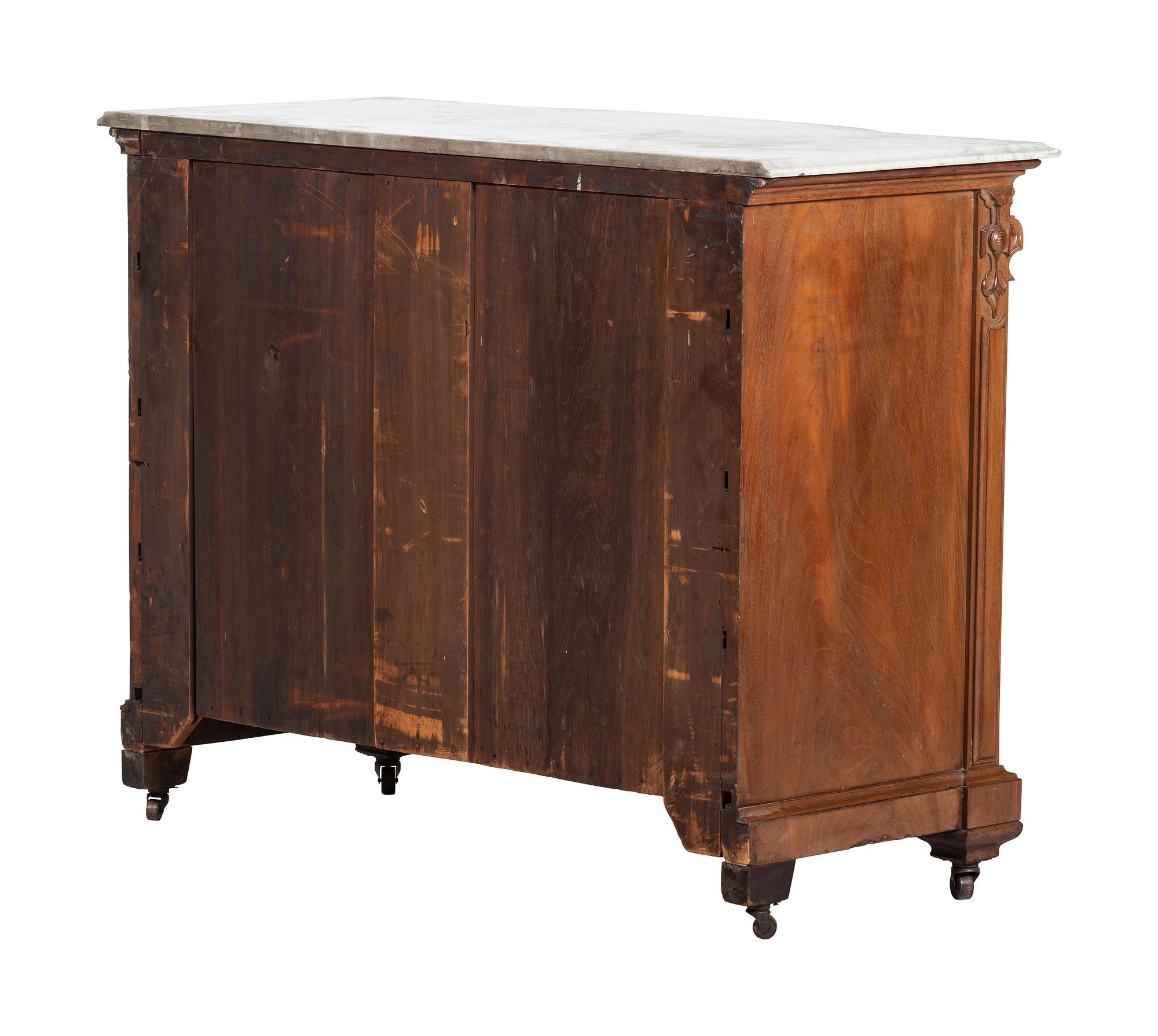 A Victorian Walnut Marble-Top Chest of Drawers