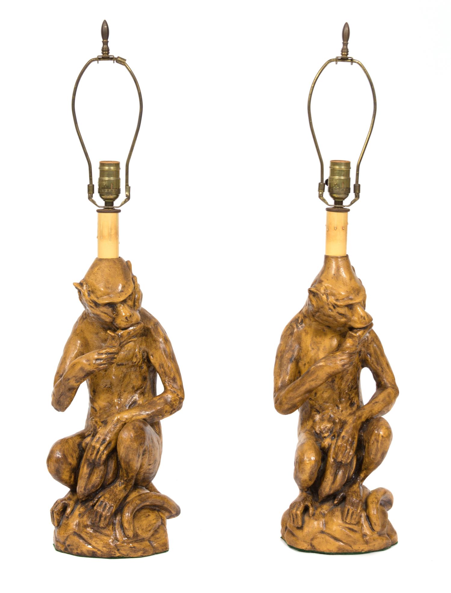 A Pair of Glazed Ceramic Monkey-Form Table Lamps Height overall 31 inches. — 20TH CENTURY
