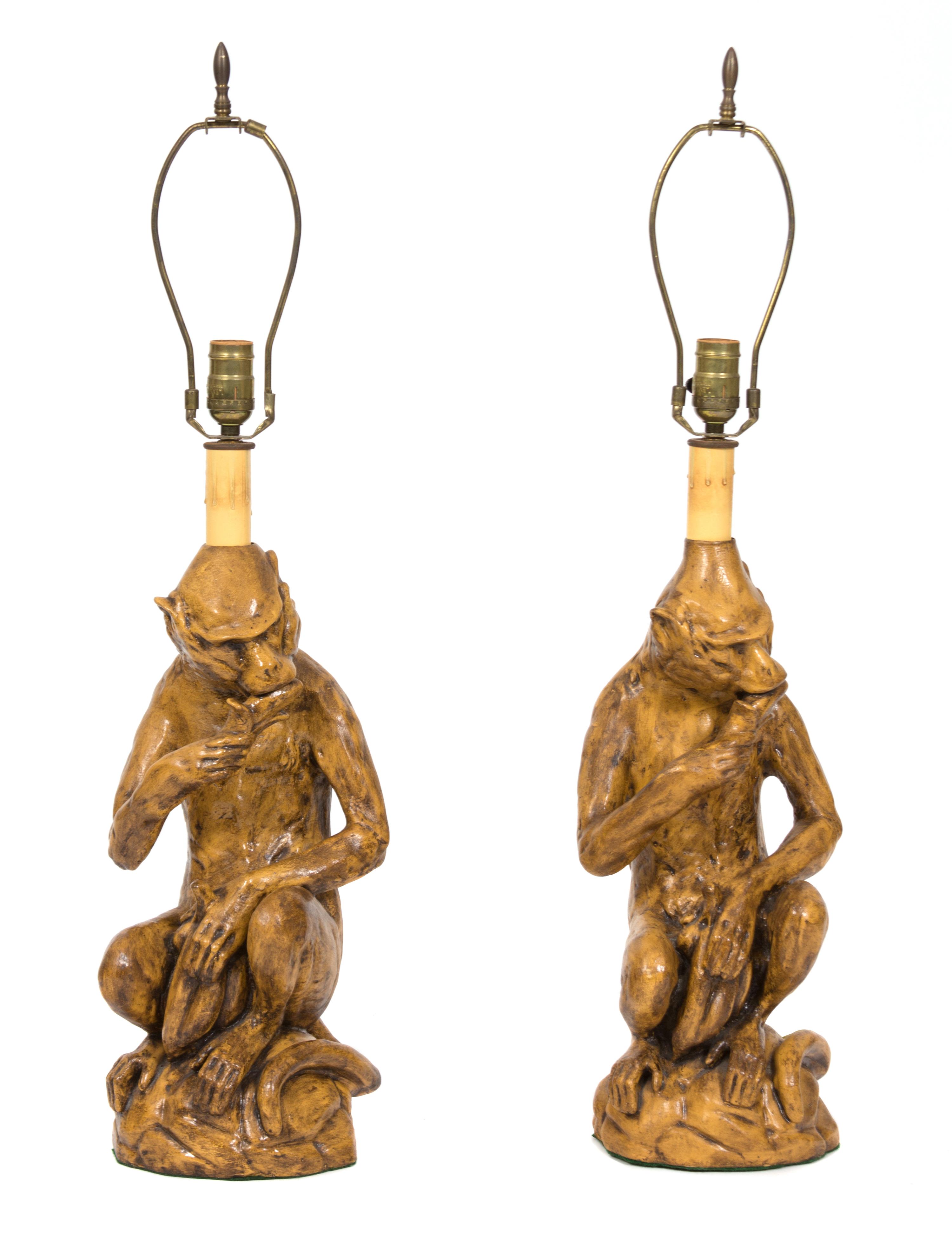 A Pair of Glazed Ceramic Monkey-Form Table Lamps Height overall 31 inches. — 20TH CENTURY
