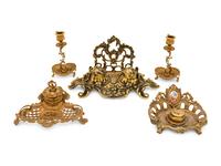 A Group of Continental Brass and Bronze Inkwells and Candlesticks