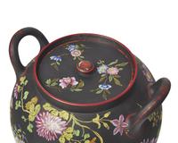 A Wedgwood Polychrome Enameled Black Basalt Potpourri Jar and Cover