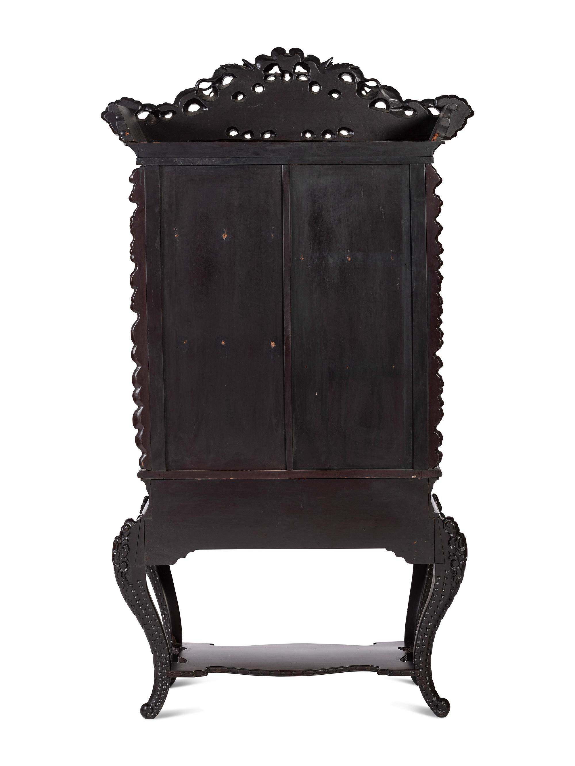 A Japanese Carved Hardwood Display Cabinet