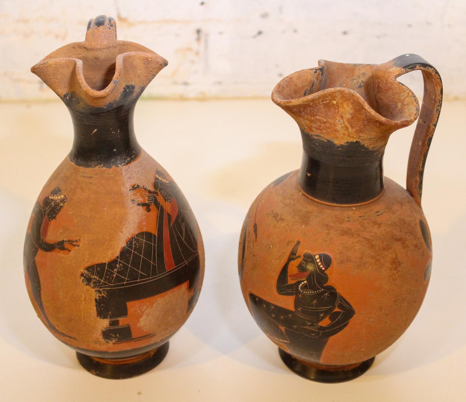 Two Similar Greek Pottery Ewers. Height 10 inches.