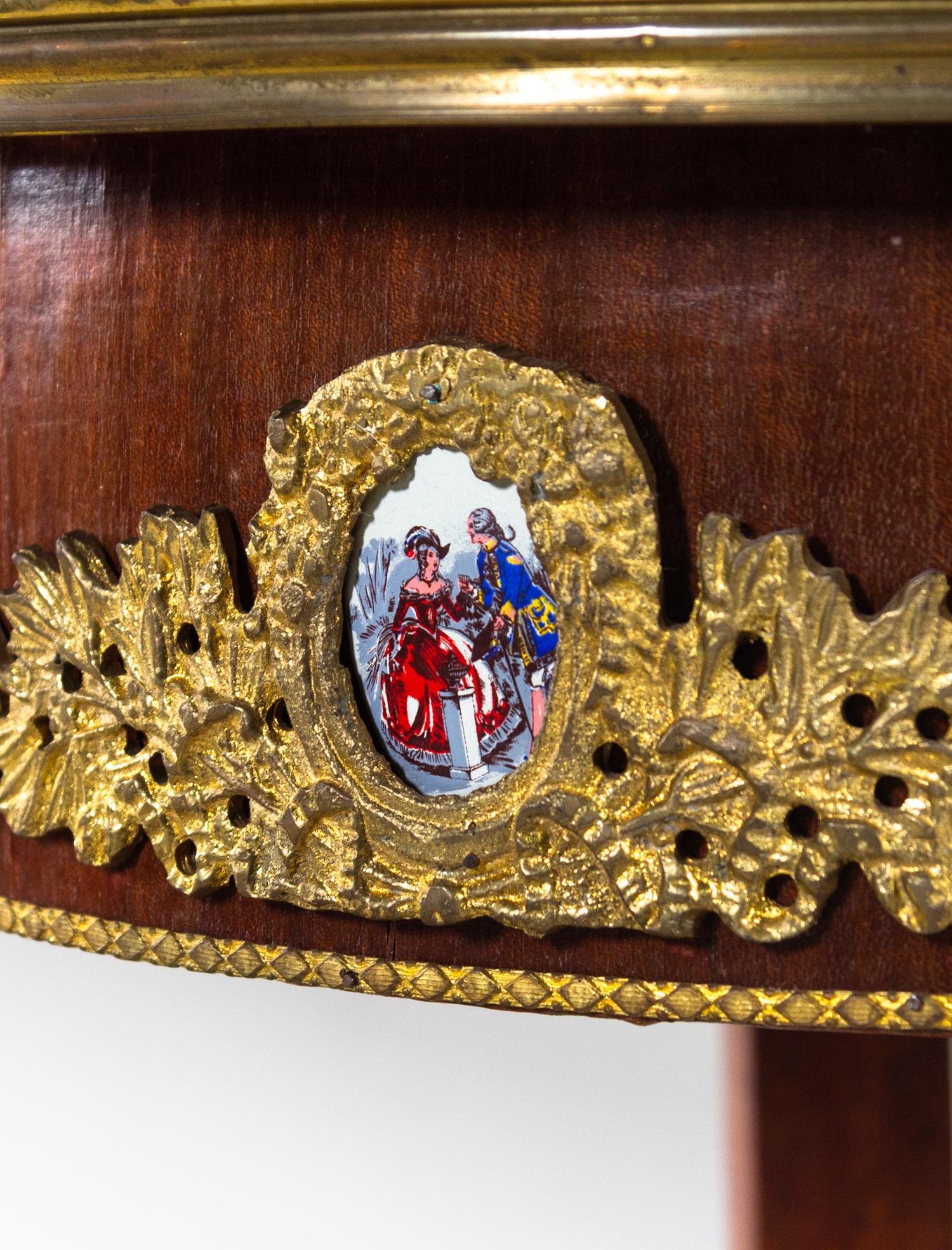 A Gilt Metal Mounted Side Table in the Manner of Adam Weisweiler