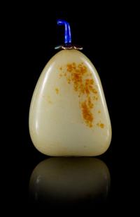 A Celadon and Russet Jade Snuff Bottle Height 2 3/4 inches.