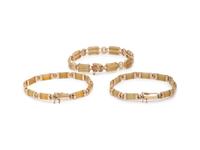 COLLECTION OF JADE AND YELLOW GOLD JEWELRY