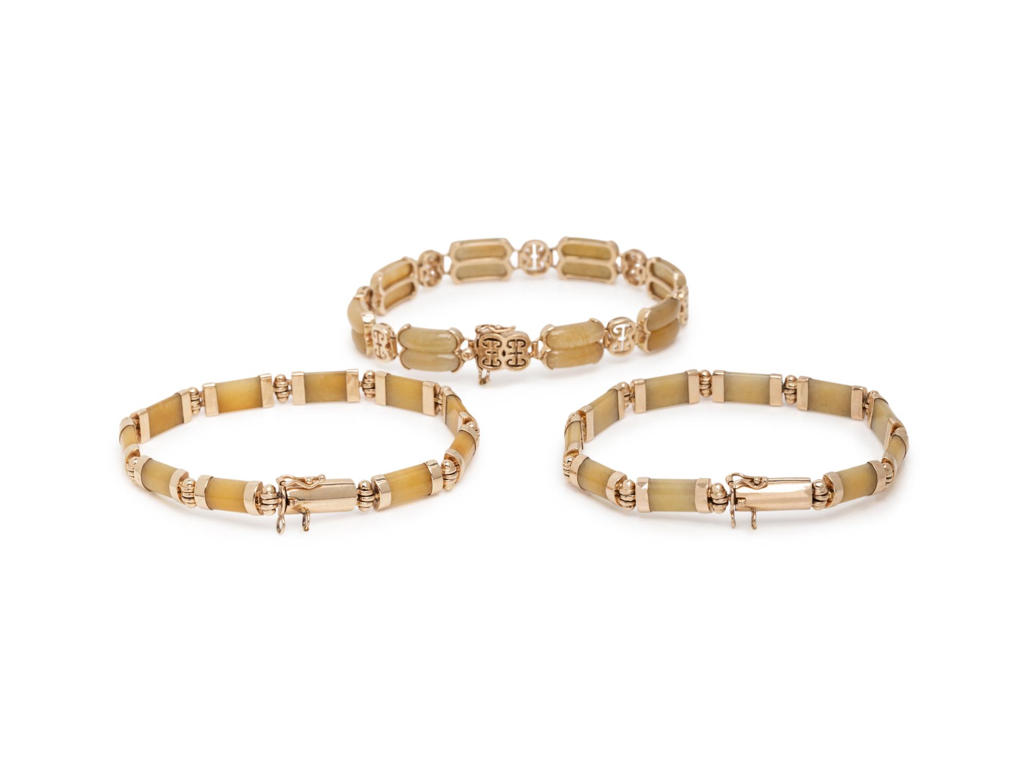 COLLECTION OF JADE AND YELLOW GOLD JEWELRY