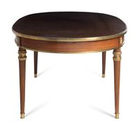A Louis XVI Style Gilt Bronze Mounted Mahogany Dining Table