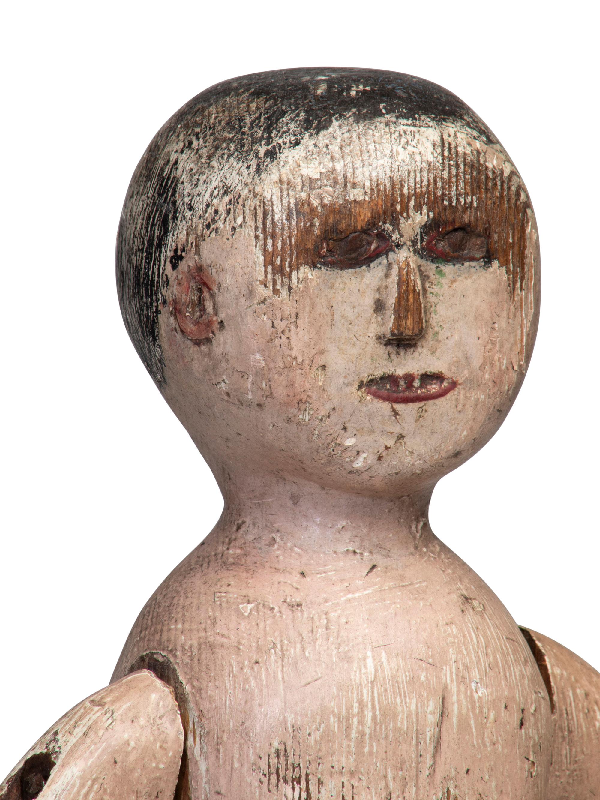 A Carved and Painted Wood Whirligig