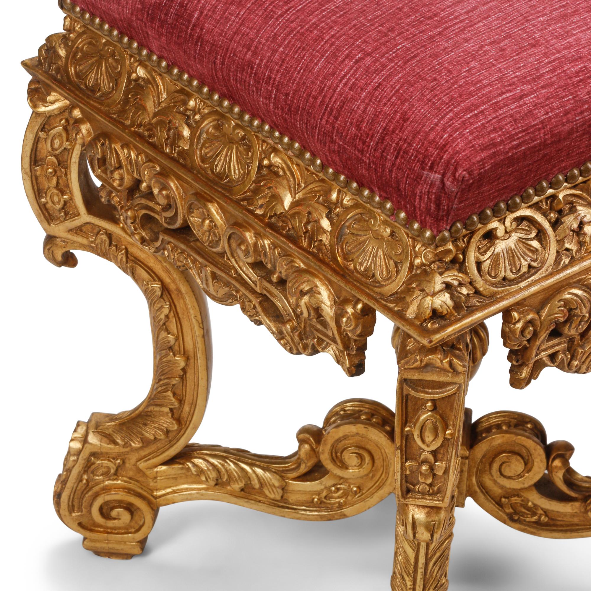 A Pair of Régence Style Carved Giltwood Stools