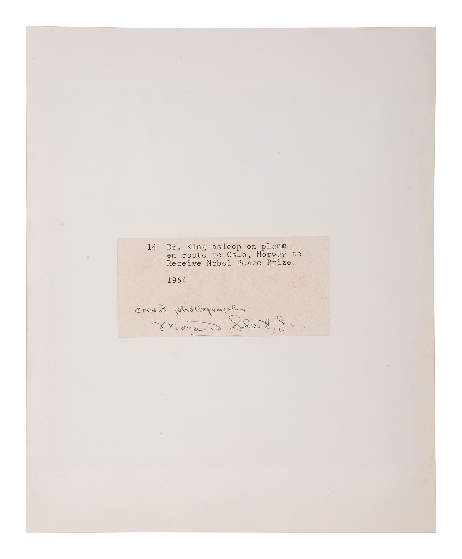 [KING, Martin Luther, Jr. (1929-1968)]. SLEET, Moneta, Jr. (1926-1996), photographer. Dr. King asleep on plane en route to Oslo, Norway to Receive Nobel Peace Prize, 1964 . Printed later.