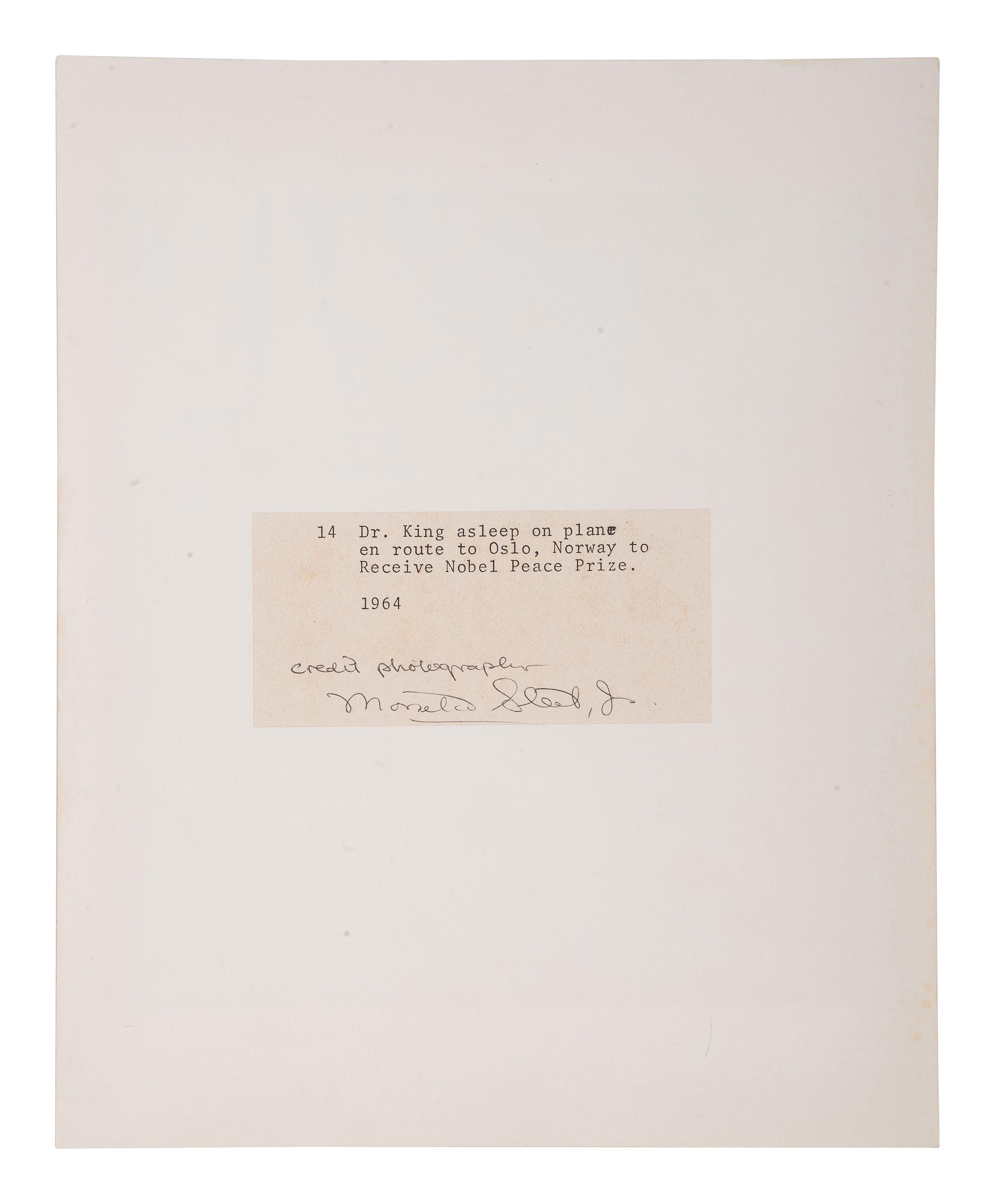[KING, Martin Luther, Jr. (1929-1968)]. SLEET, Moneta, Jr. (1926-1996), photographer. Dr. King asleep on plane en route to Oslo, Norway to Receive Nobel Peace Prize, 1964 . Printed later.