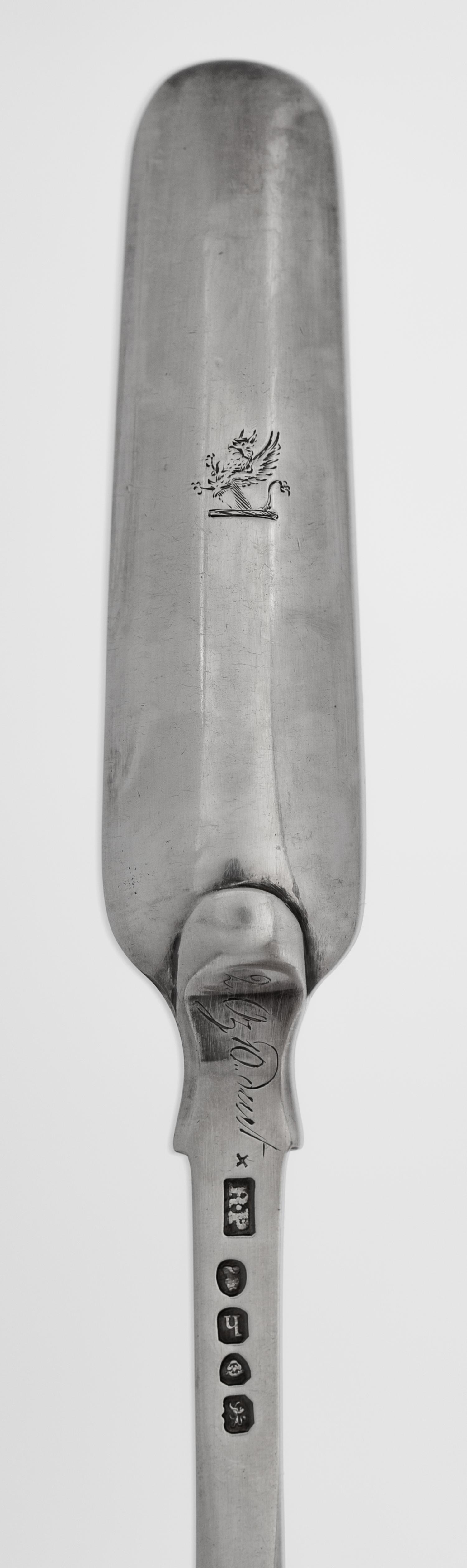A Group of Four Georgian Silver Marrow Scoops