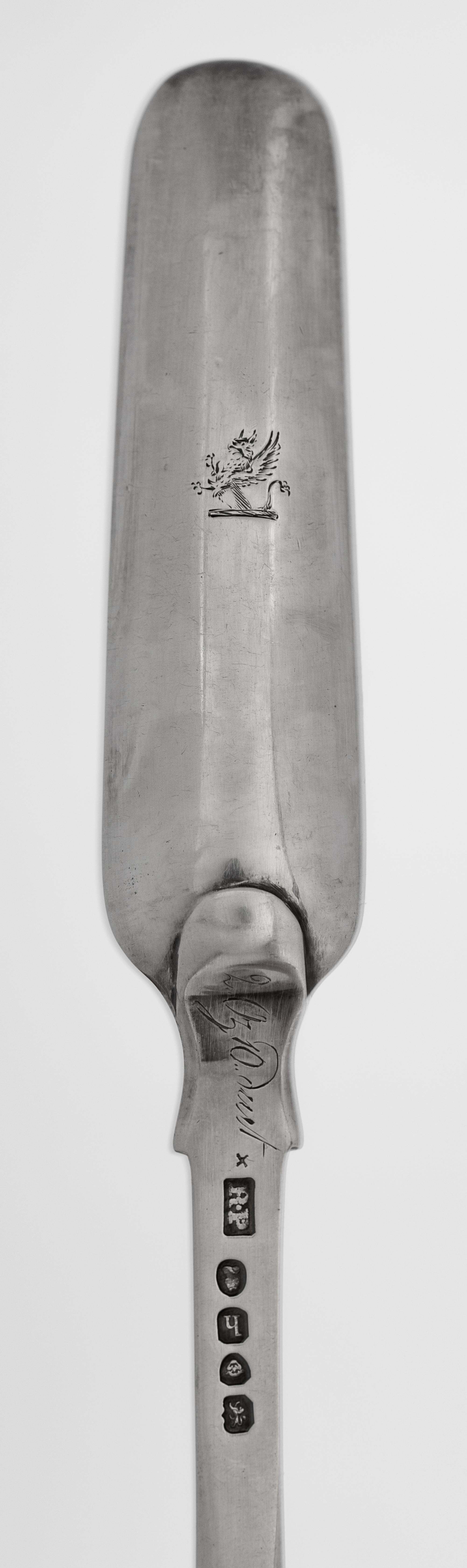 A Group of Four Georgian Silver Marrow Scoops