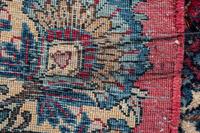 A Kirman Wool Rug